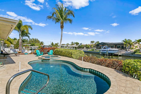 Canal front home with boat access and and private pool and spa with fountain