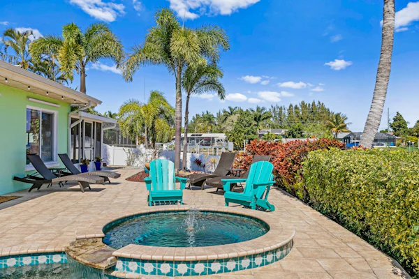 Canal front home with boat access and and private pool and spa with fountain