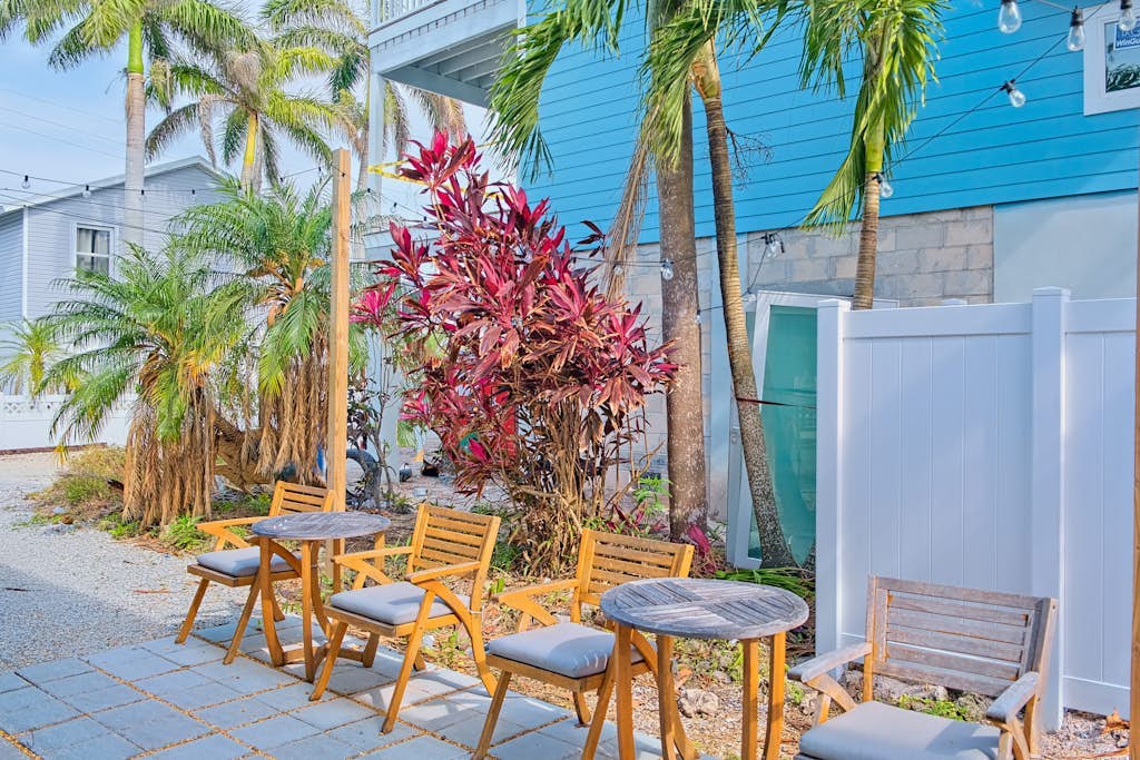 2nd-floor duplex near beach with heated pool, balcony, grill, W/D
