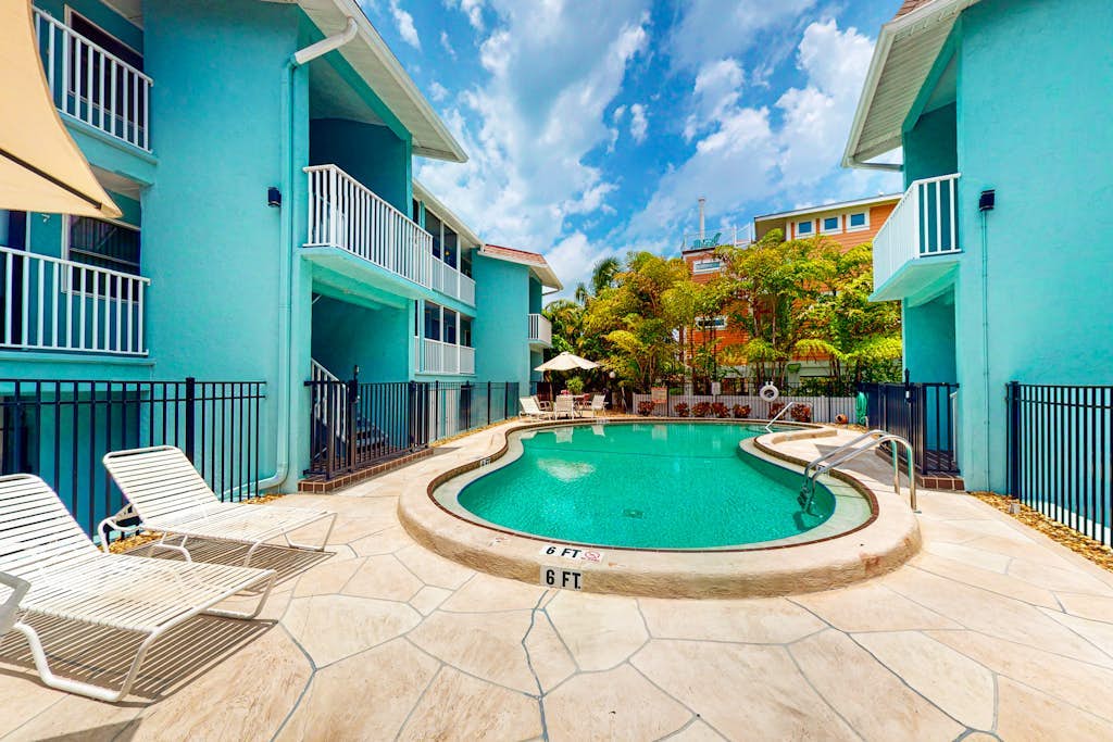 Breezy condo with WiFi & pool - minutes from beach, shopping, & dining