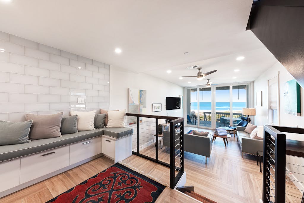 Beachfront condo with WiFi, two decks, Gulf views & pool - walk to the trolley