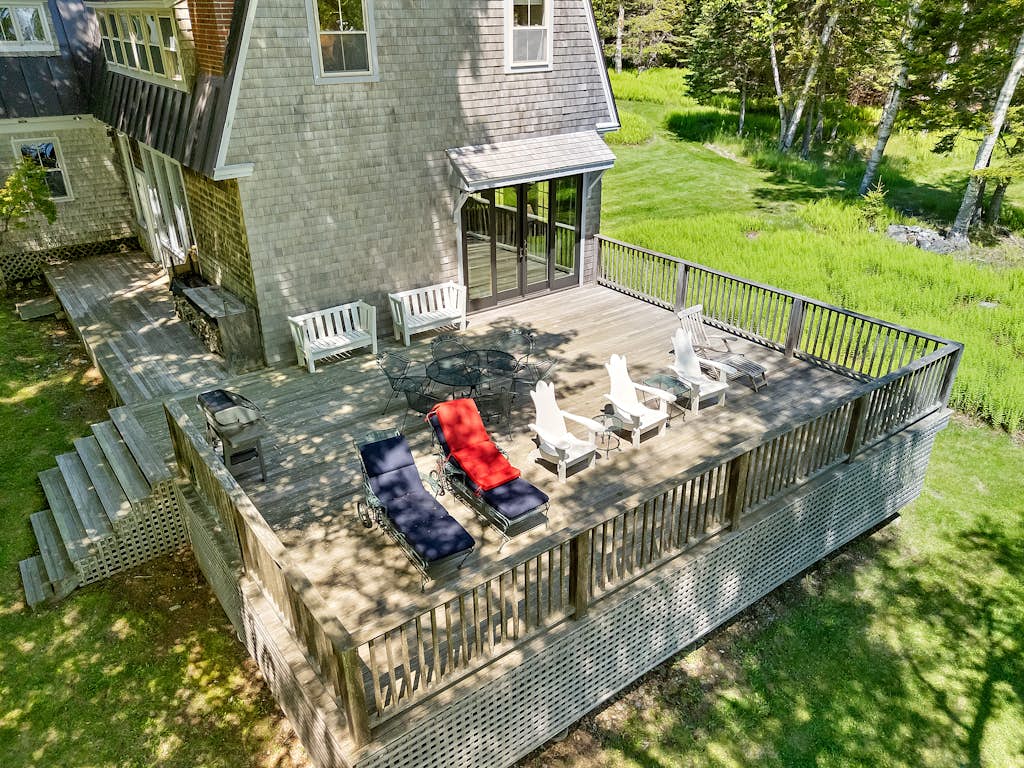 Oceanfront 5BR island retreat with deck, fireplace, and kayaks