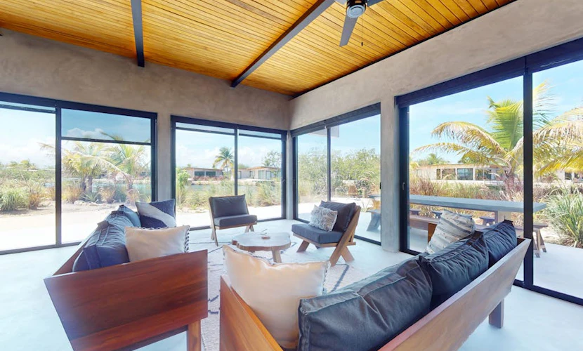 Elegant waterfront villa with private terrace, pool, beach access & 4 en-suites