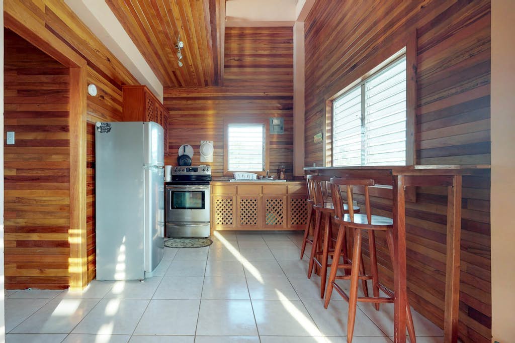 Entire duplex with patio, balcony, partial AC & WiFi - next to a Caribbean beach