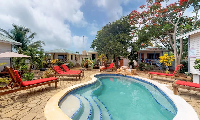 Cabana with WiFi and a shared pool, patio area, and grill - walk to the beach
