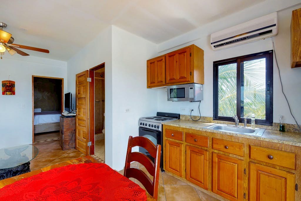 Upper-Level Resort Gem with Great Views, WiFi, AC, Shared Pool & Rooftop Deck