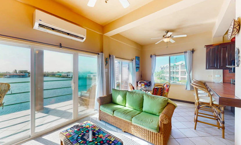 Comfortable condo with lagoon-view balcony, WiFi, AC & pool access