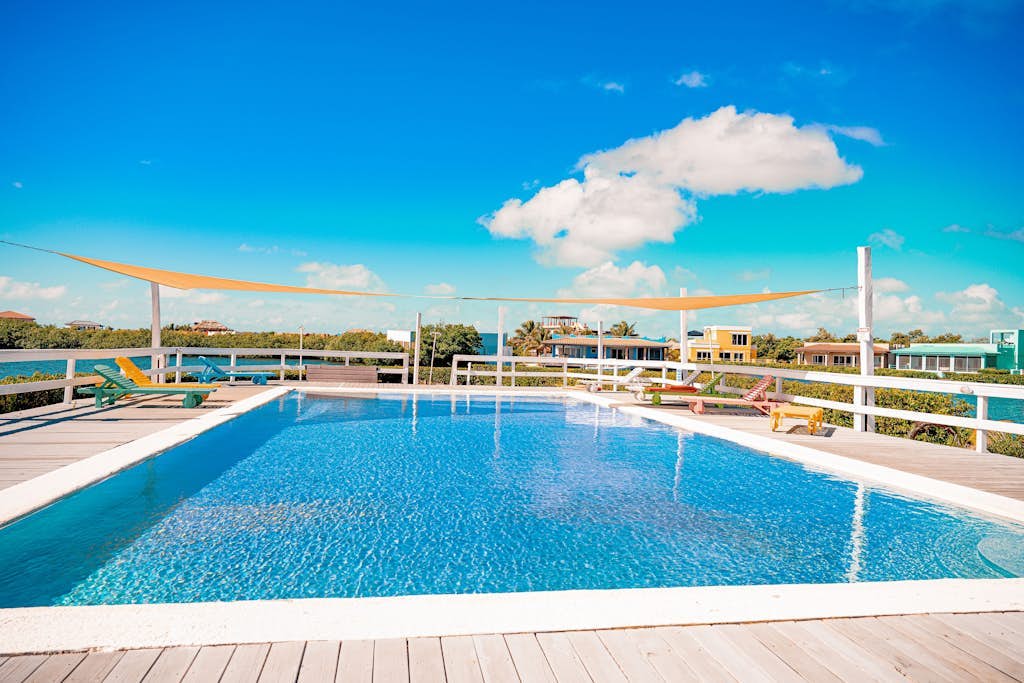 Comfortable condo with lagoon-view balcony, WiFi, AC & pool access