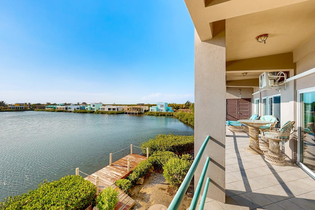 Comfortable condo with lagoon-view balcony, WiFi, AC & pool access