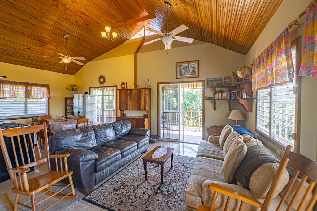 Charming cabin with private balcony, lush views & eco-friendly features