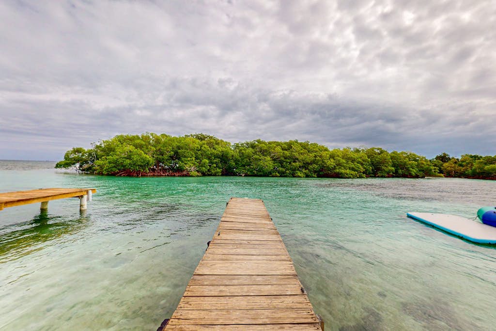 Rustic beachfront cabin with private deck, ocean views & family-friendly vibe