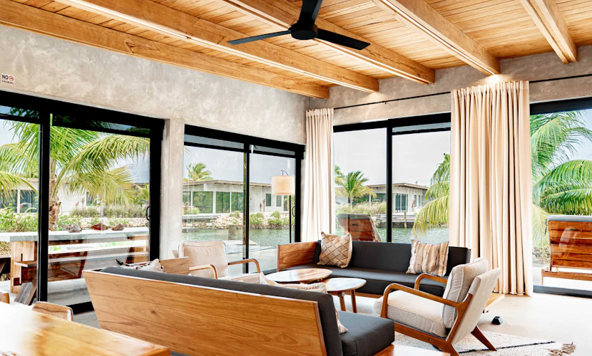 Unwind at this modern waterfront villa in Seabird, where a private splash pool, private dock, and spacious indoor-outdoor living create the perfect setting for your Placencia getaway. With four bedrooms, room for up to eight guests, and access to Seabird's community pool and café, it's an inviting retreat for families and friends exploring Belize.
