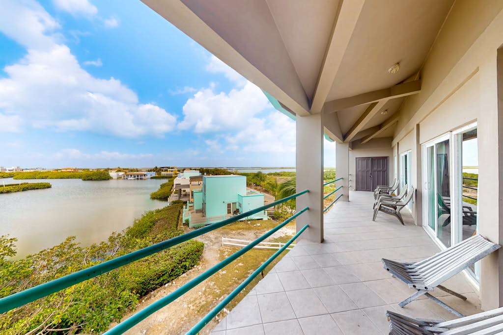 Tranquil lakefront condo with ocean views, shared pool, central AC & free WiFi!