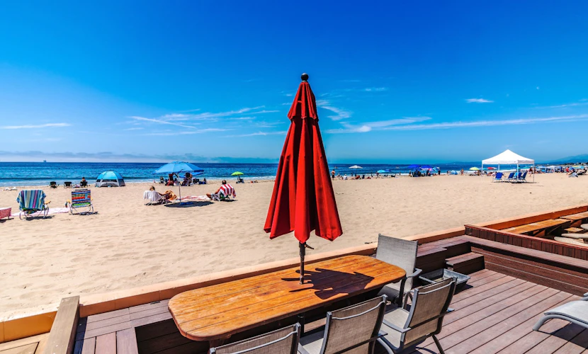 Beachfront Ground Floor Condo | King Bed Ocean Views Private Patio
