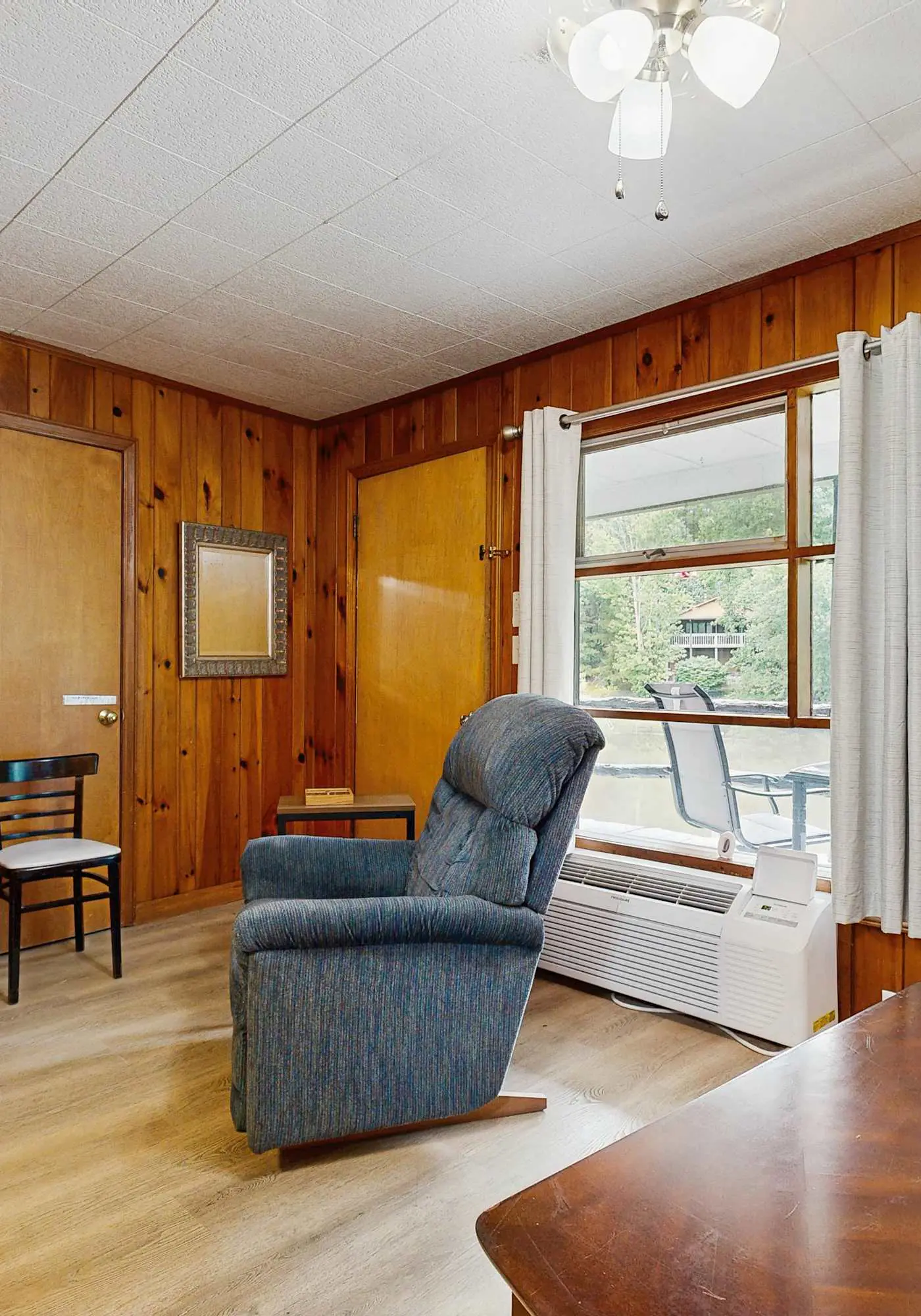 Lakeside condo, dog-friendly, AC, large porch, shared amenities, beach access, pool, tennis