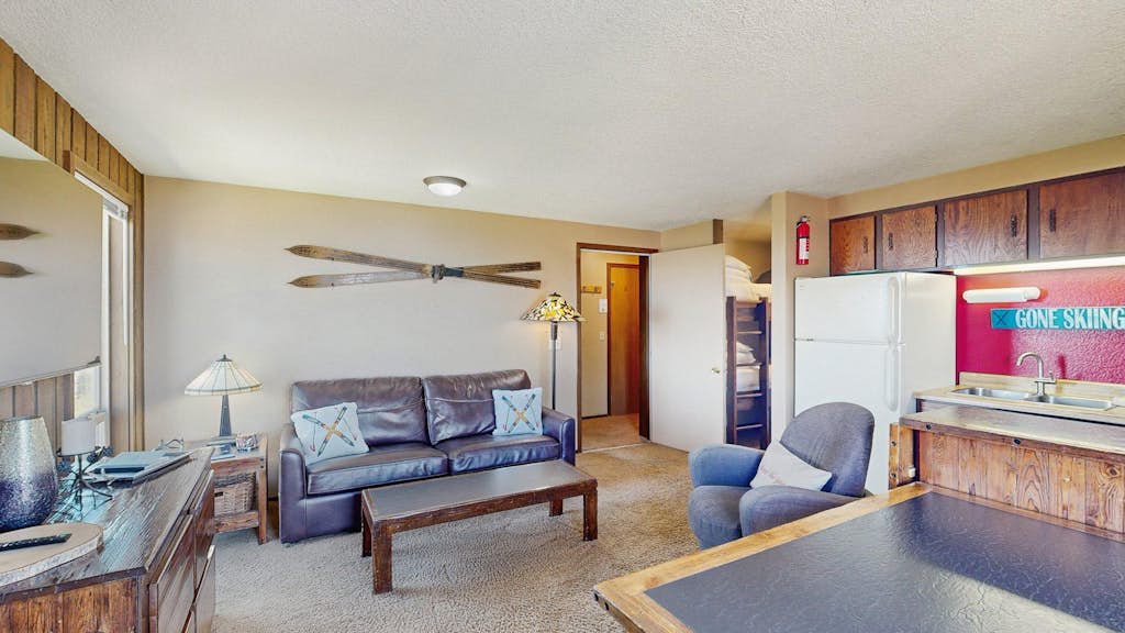 Make the most of your time on the mountain from this second-floor ski-in/ski-out condo in Bogus Basin. A cozy home base with easy access to the slopes and trails, it features a functional kitchen, flexible sleeping arrangements, and a private deck overlooking Boise. Whether you're visiting for ski season or summer adventures, you'll be just steps from everything Bogus Basin has to offer.