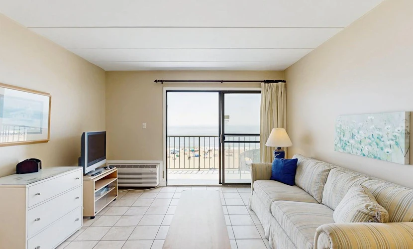 Fifth-floor ocean-view condo with boardwalk views, pool access, washer & dryer, and AC