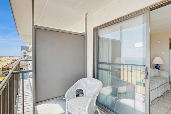 Fifth-floor ocean-view condo with boardwalk views, pool access, washer & dryer, and AC