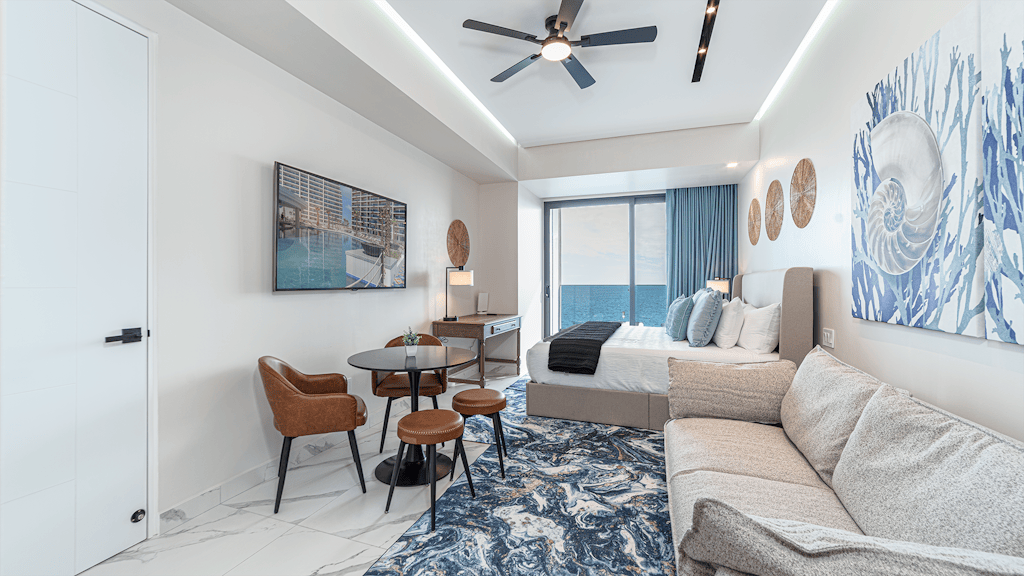 Encantame Soleil studio with king bed, 1 bath, for up to 2 adults.