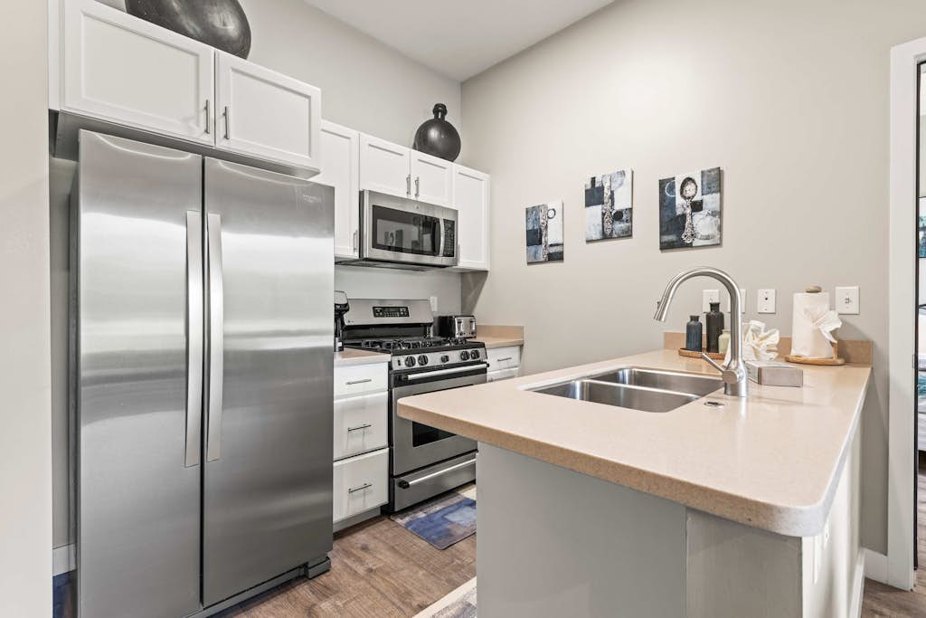 Escape to the perfect mountain getaway in this beautifully furnished 1-bedroom, 2-bathroom condo in Heber City. Thoughtfully designed for comfort and convenience, this rare floor plan offers the privacy of two full bathrooms, making it ideal for couples, small families, business travelers, or friends exploring Utah's Wasatch Mountains.

Relax in the bright, open living area after a day of adventure, prepare meals in the fully equipped kitchen, and unwind in the spacious bedroom featuring plush bedding and ample storage. Whether you're here for a weekend escape or an extended stay, you'll have everything you need to feel right at home.

Located just minutes from Jordanelle Reservoir, Deer Valley East Village, and Park City, you'll enjoy easy access to world-class skiing, hiking, mountain biking, boating, golf, and year-round outdoor recreation. Historic Main Street Park City, local restaurants, shopping, and the charm of downtown Heber are all just a short drive away.

Highlights
Rare 1 bedroom, 2 full bathroom layout
Cozy fireplace for relaxing evenings
Fully equipped kitchen
Comfortable open-concept living area
On-Site Pool & Fitness Center
High-speed Wi-Fi
Minutes from Deer Valley, Park City and Jordanelle Reservoir
Perfect for vacations, remote work, or extended stays

Whether you're chasing powder in the winter, lake days in the summer, or colorful mountain scenery in the fall, this inviting condo is the perfect home base for making unforgettable memories in every season.