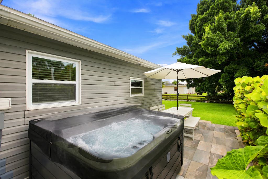 Discover the perfect waterfront escape in beautiful Naples, Florida! This spacious four-bedroom, single-level home is nestled along a peaceful canal, offering the ideal setting for a relaxing Southwest Florida vacation. Designed with comfort and convenience in mind, this home provides plenty of space for families and groups to gather, unwind, and create lasting memories.

Wake up to tranquil water views and enjoy your morning coffee on the outdoor patio before spending the day exploring everything Naples has to offer. Bring your kayak or fishing gear and take advantage of the home's canal access, or venture out to nearby white-sand beaches, championship golf courses, nature preserves, and world-class shopping and dining. Whether you're cycling through scenic neighborhoods, enjoying a day on the water, or watching the sunset from the backyard, this home is the perfect base for your Florida adventure.

Inside, you'll find a fully equipped kitchen with everything needed to prepare meals, inviting living spaces for relaxing after a day of sightseeing, and comfortable accommodations for the entire group. The private backyard offers a peaceful retreat where you can enjoy the waterfront setting and Florida sunshine.

Conveniently located near Naples' most popular attractions while offering the privacy of a quiet waterfront neighborhood, this home combines relaxation, recreation, and coastal charm. Whether you're planning a family vacation, a getaway with friends, or an extended stay, you'll enjoy all the comforts of home in one of Southwest Florida's most desirable destinations.