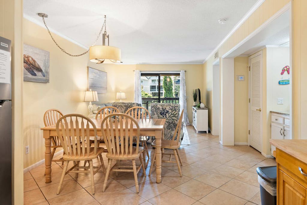 Enjoy a relaxing Hilton Head Island getaway in this comfortable two-bedroom villa at Hilton Head Island Beach and Tennis Resort. Located on the first floor of Building B, this villa features a private furnished balcony with lagoon views, a full kitchen, two full bathrooms, and accommodations for up to six guests. Spend your days at the beach, lounging by the oceanfront pool, or enjoying the resort's tennis courts, pickleball, dining, and family-friendly amenities.