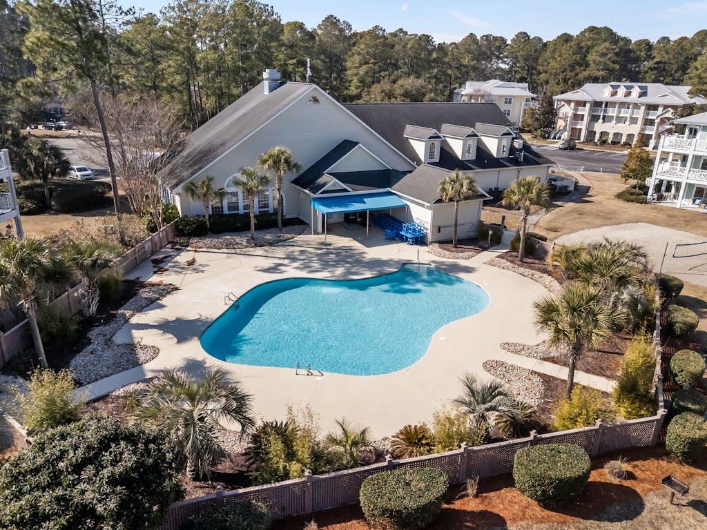 Coastal Golf Course Condo – Shared outdoor pool and fitness center