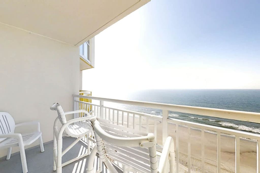 17th-floor oceanfront condo with sunrise-view balcony, pools, hot tub, gym