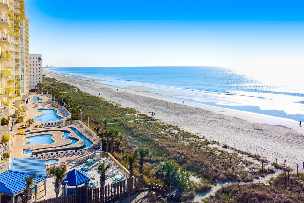 Beach-view 8th-floor studio with hot tubs, pools, kitchenette, lazy river, & W/D