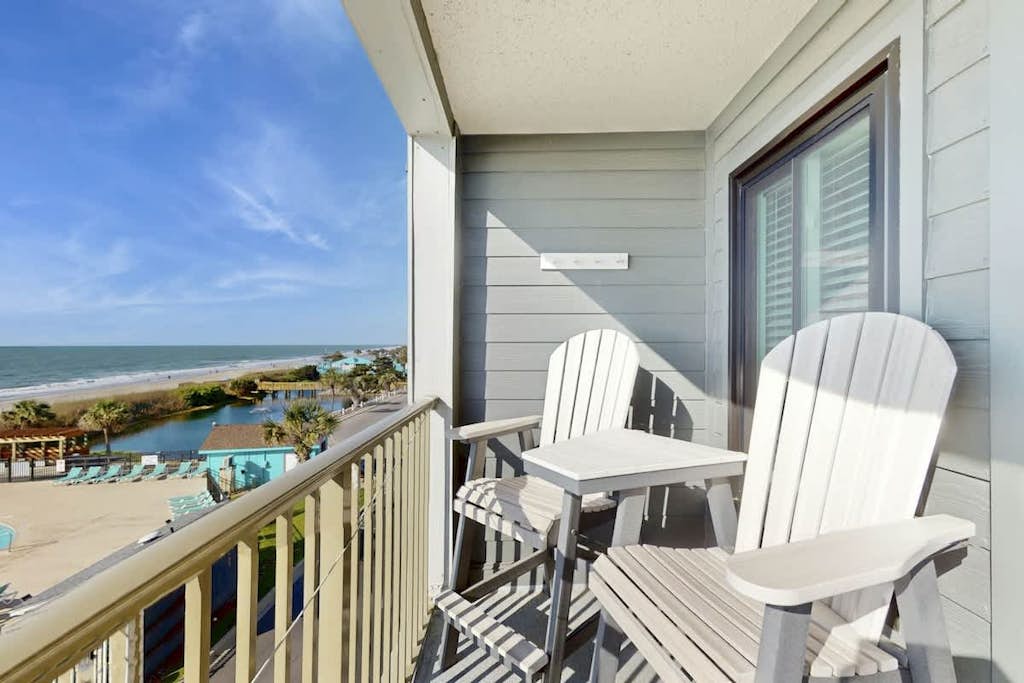 Incredible waterfront condo with pool, hot tub, sauna, balcony, & great views