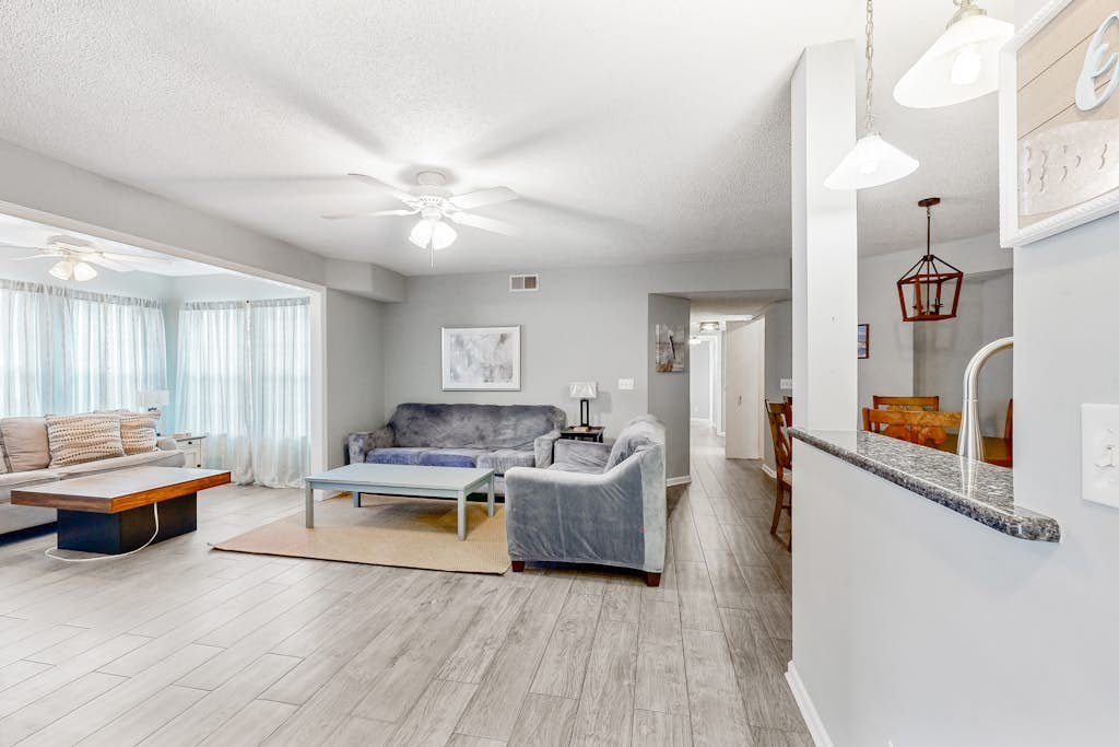 Charming condo with water views, pool, washer/dryer, & central AC