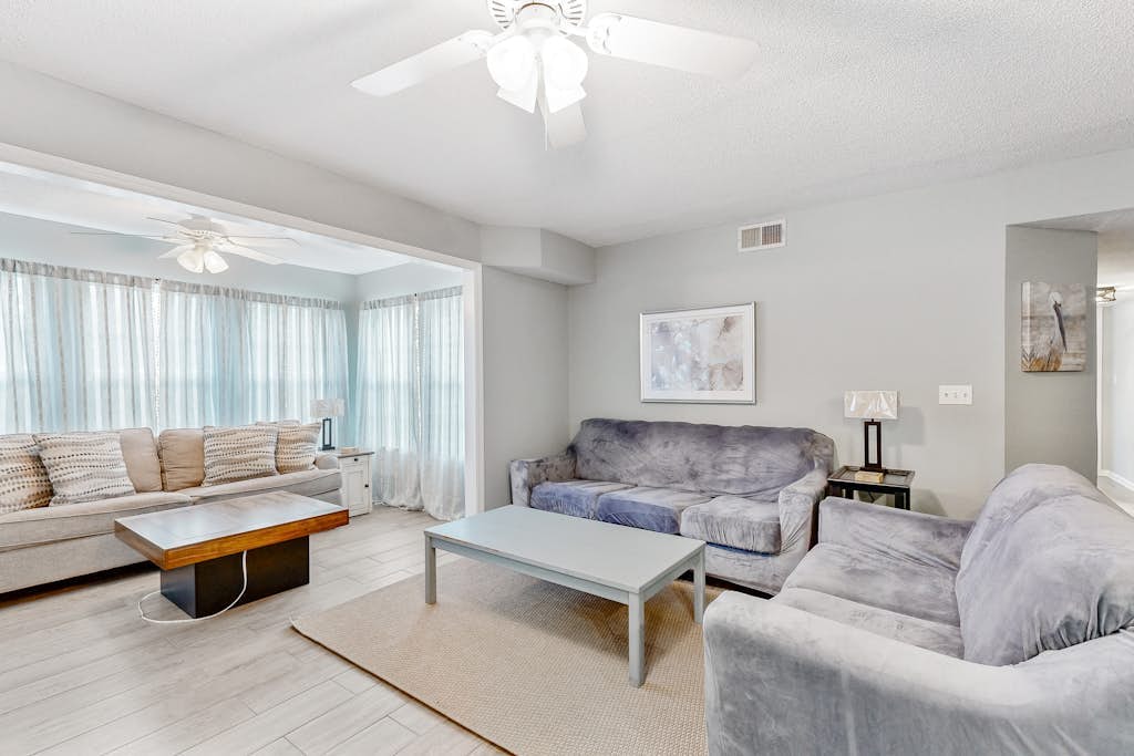 Charming condo with water views, pool, washer/dryer, & central AC