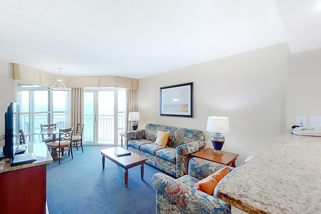 19th-floor partial ocean-view snowbird-friendly condo with AC & W/D