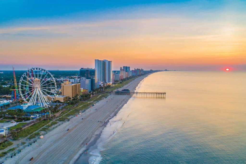 Resort home with screened balcony, pools, hot tub, golf courses, & beach shuttle