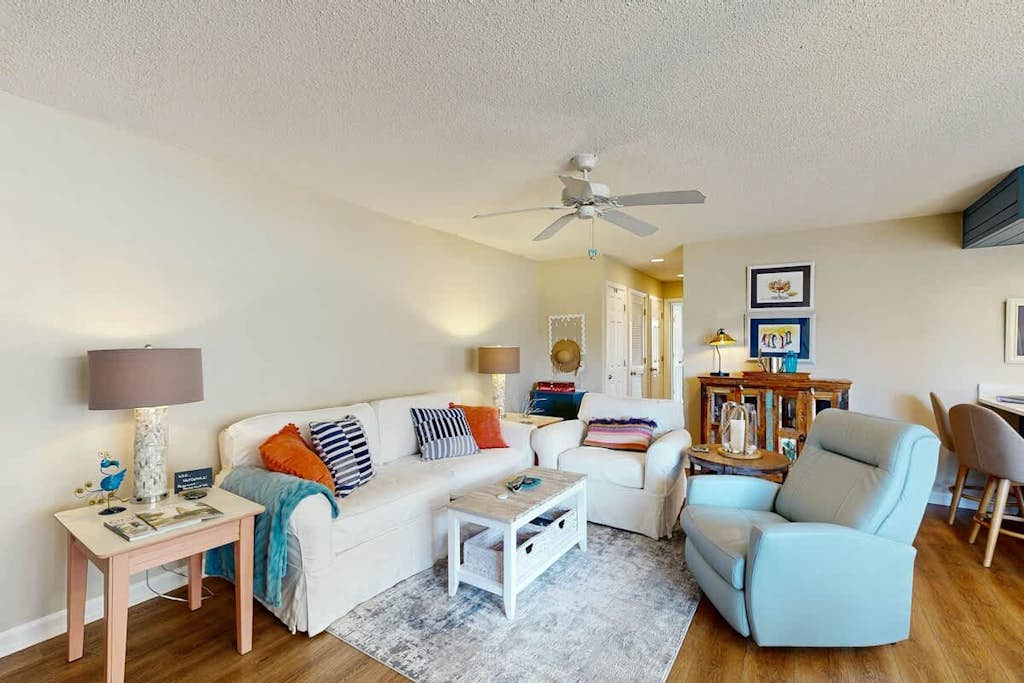 Pool view condo with balcony, pool, hot tub & steps to beach