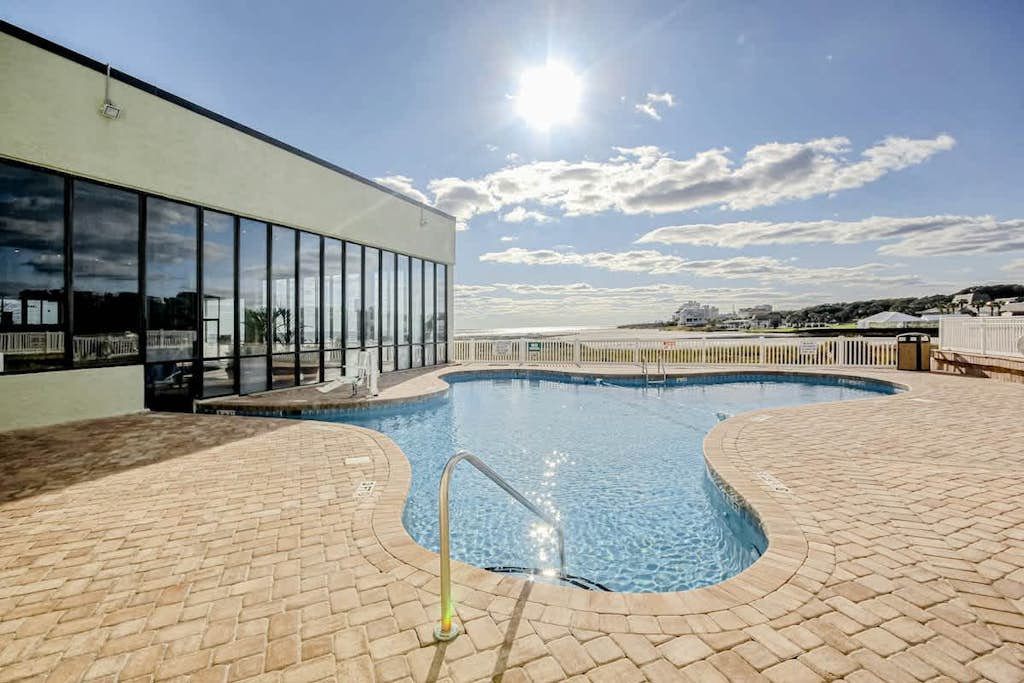 Tenth-floor oceanfront condo with pools, WiFi, balcony, AC, W/D, & great view