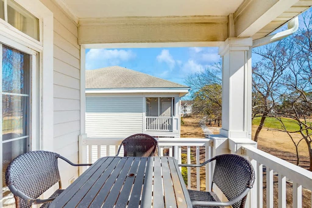 3rd-floor Barefoot Resort condo with on-site pools, hot tub, & nearby golf