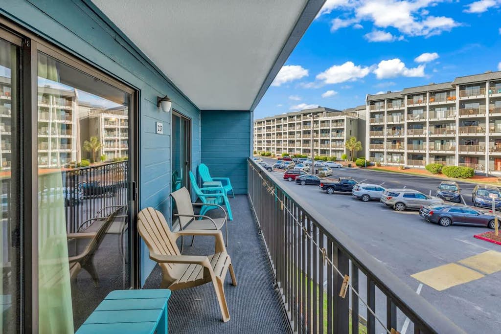 Family-friendly beach condo with balcony, pool, sauna, hot tub, & WiFi