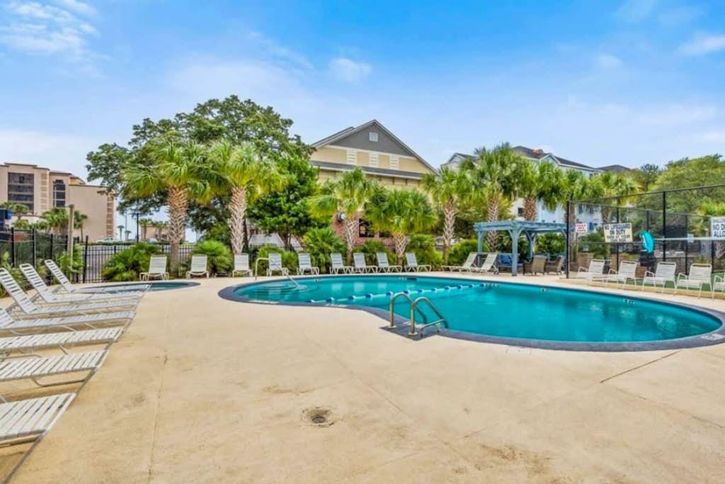 Oceanview condo with pool, private balcony, W/D - steps to beach