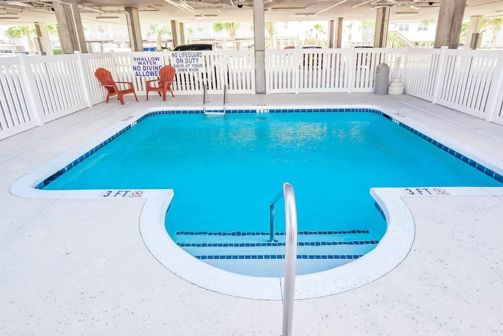 Oceanview condo with pool, private balcony & steps to beach