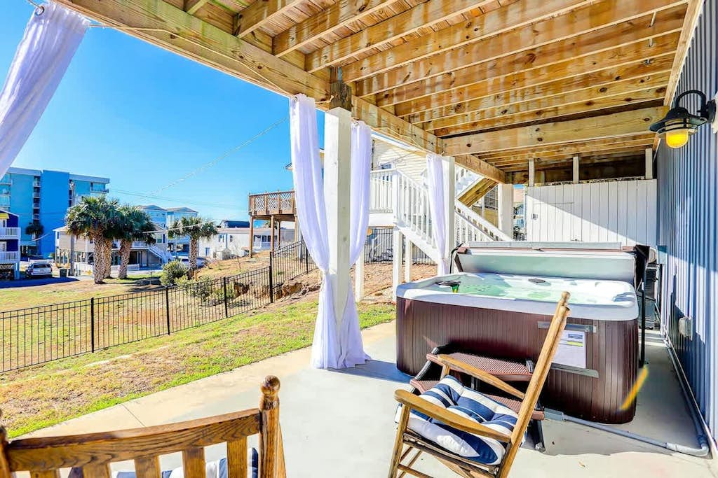 Sprawling home near the beach with a hot tub, game room, balcony, & views