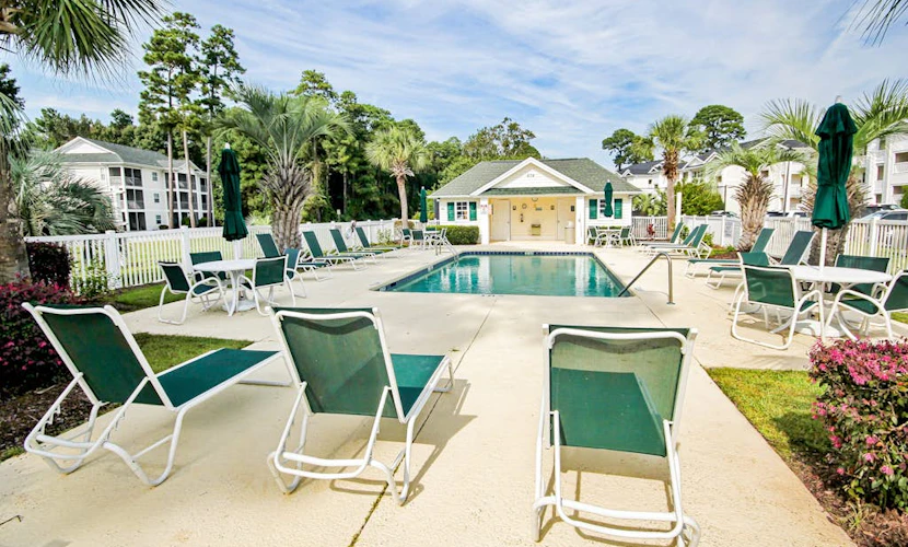 Relax and unwind in style at this Myrtle Beach condo w/ hot tub, pool, & views