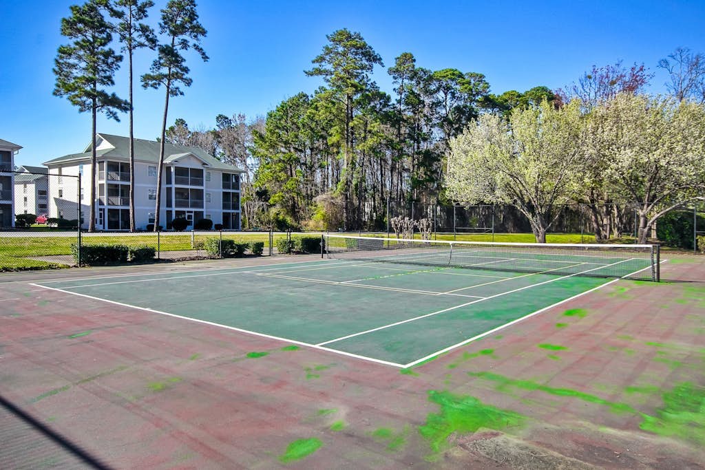 Relax and unwind in style at this Myrtle Beach condo w/ hot tub, pool, & views