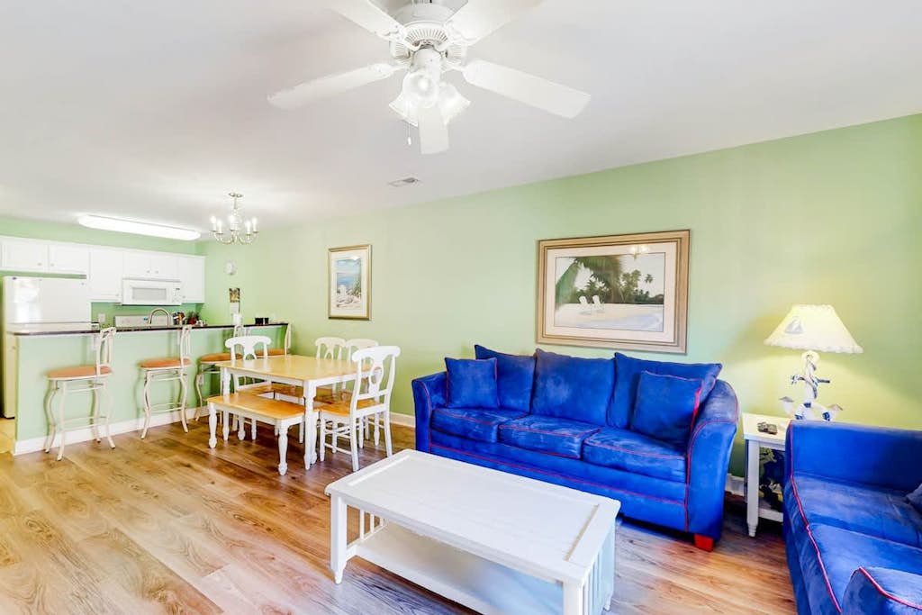 Dog-friendly townhome steps from the sand with private patio, central AC, & W/D