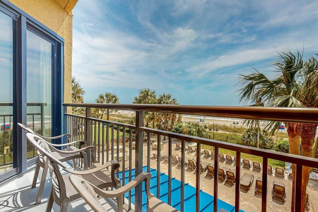 2nd-floor oceanfront condo with WiFi, pool, hot tub & AC - snowbird-friendly