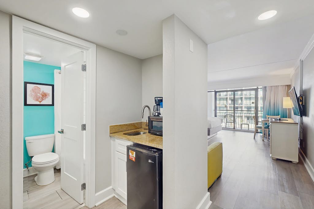 Oceanview studio with pool, private balcony & beach access
