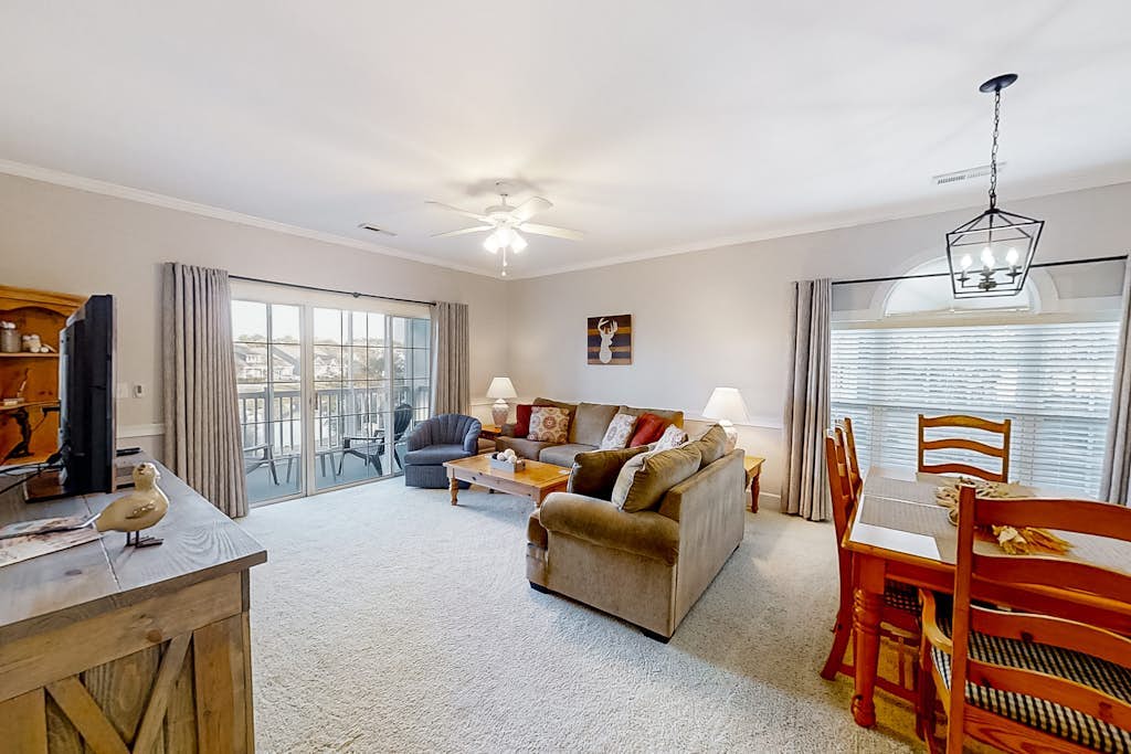 Water-view condo with on-site pool & balcony - near beach & entertainment