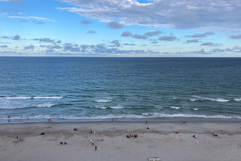 Oceanfront studio with private balcony, A/C, & beach access