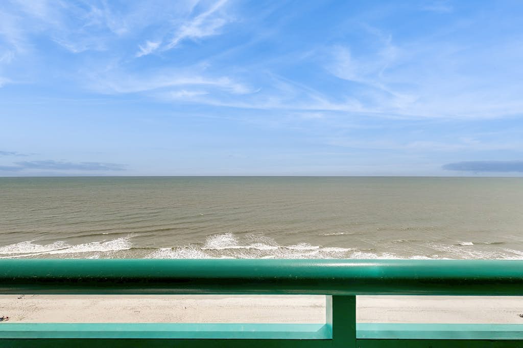 Oceanfront studio with private balcony, pool & direct beach access
