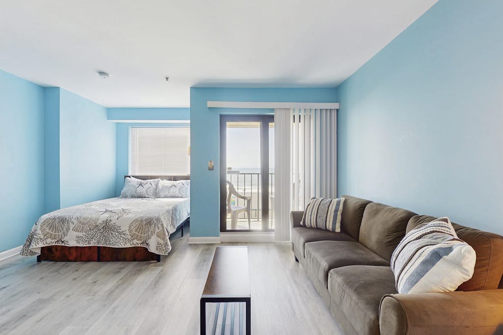 Oceanfront home with shared pools, hot tub, sauna, gym + beach access/free WiFi